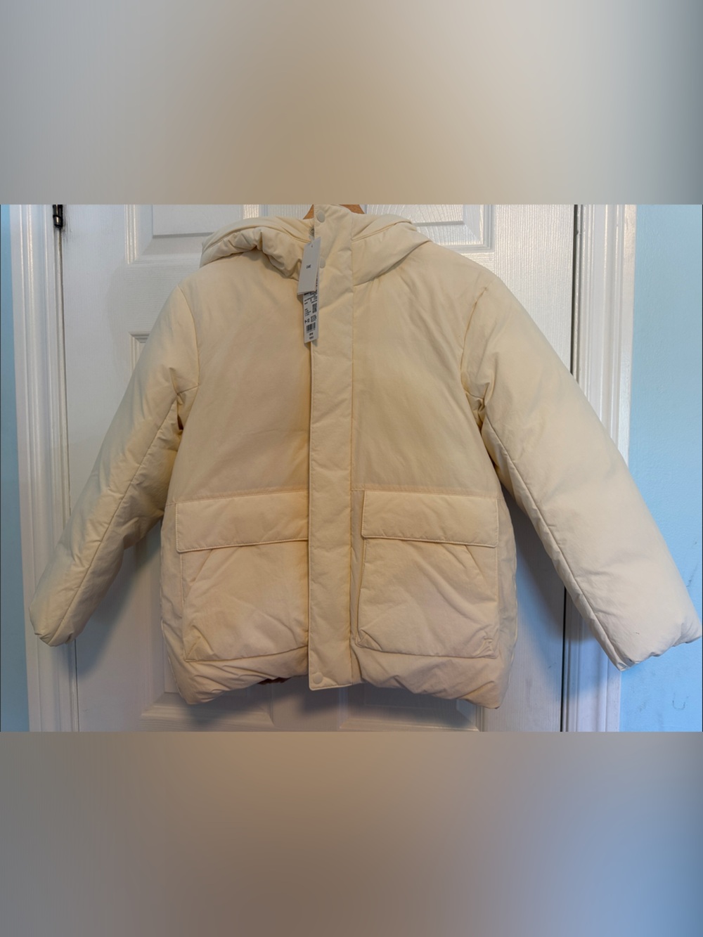 Kids Off white down Jacket from Uniqlo